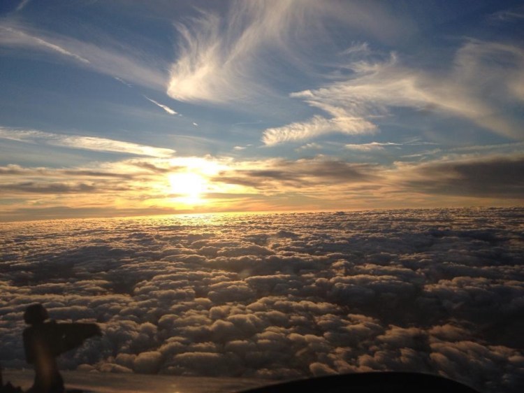 View of the clouds gliding through a golden Central Florida sunset, symbolizing flight training and the journey to becoming a pilot.
